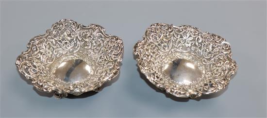 A pair of late Victorian pierced silver bonbon dishes, Henry Matthews, Birmingham, 1894, 11.5cm.